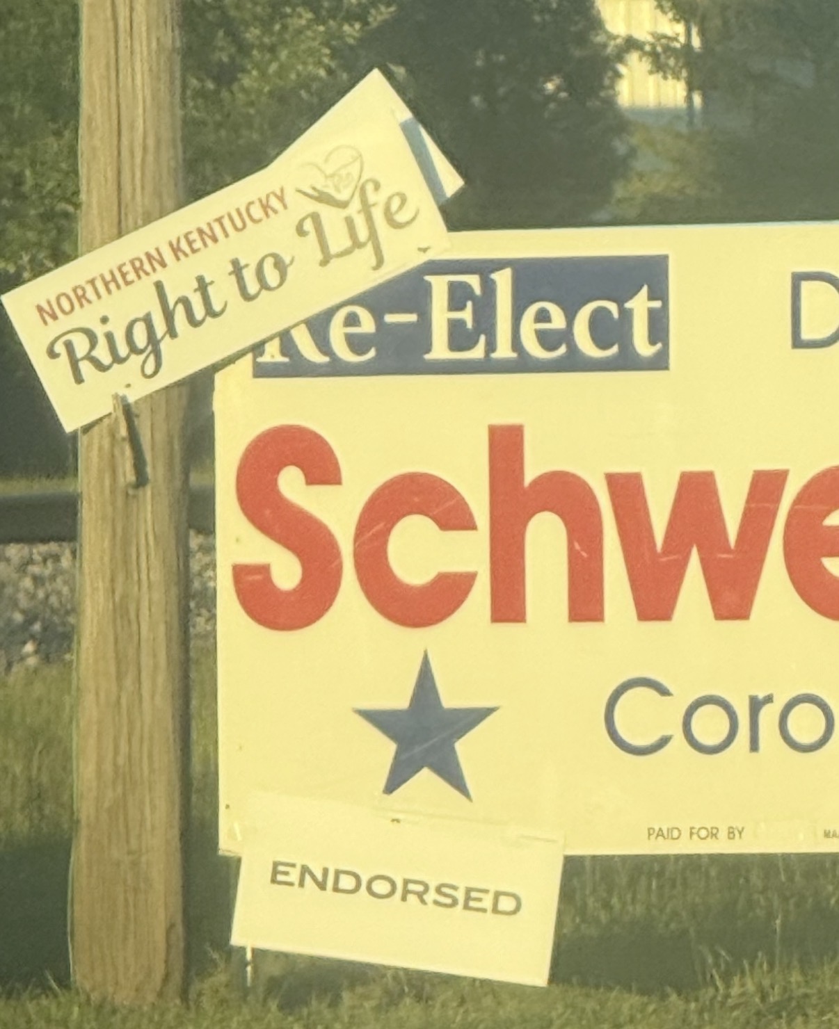 Schweitzer yard sign with a Northern Kentucky Right to Life sign and an ENDORSED placard